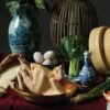 A close up of a dining table showcasing poultry and other fresh ingredients