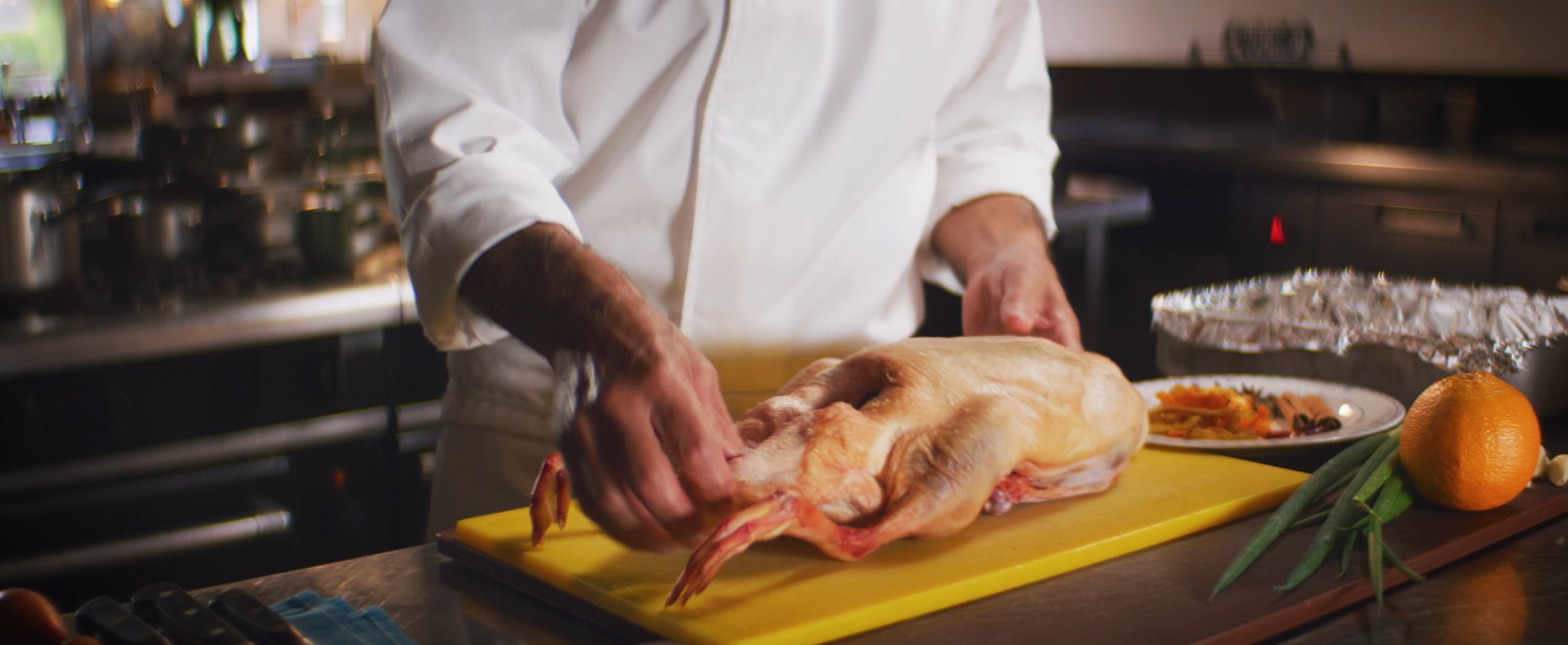 chef preparing roast duck